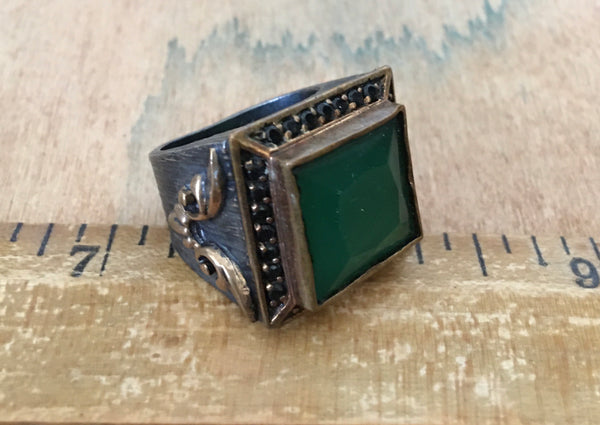 Sterling ring with tiny Black spinel and emerald centerpiece