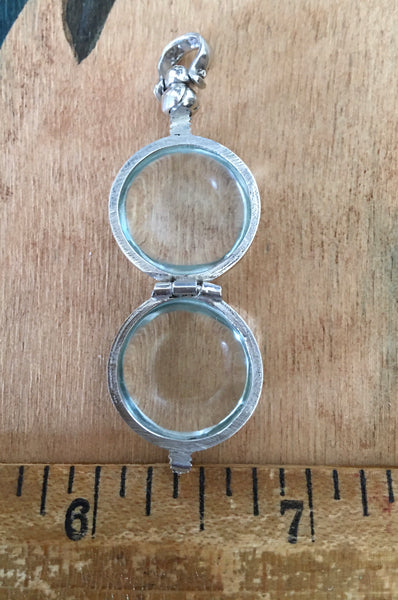 Small round sterling locket