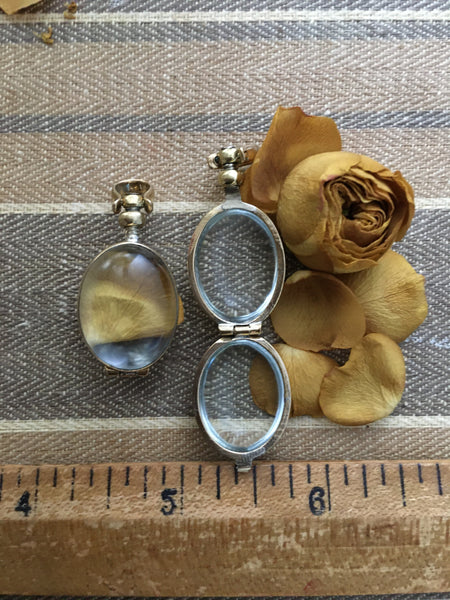 Mini oval brass locket