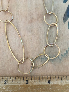 Asymmetrical brass chain
