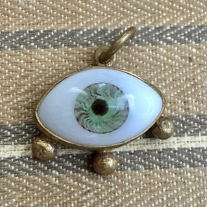 Brass medium green eye with stud lashes