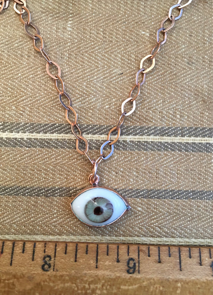 Rose gold green eye on a diamond linked rose gold chain