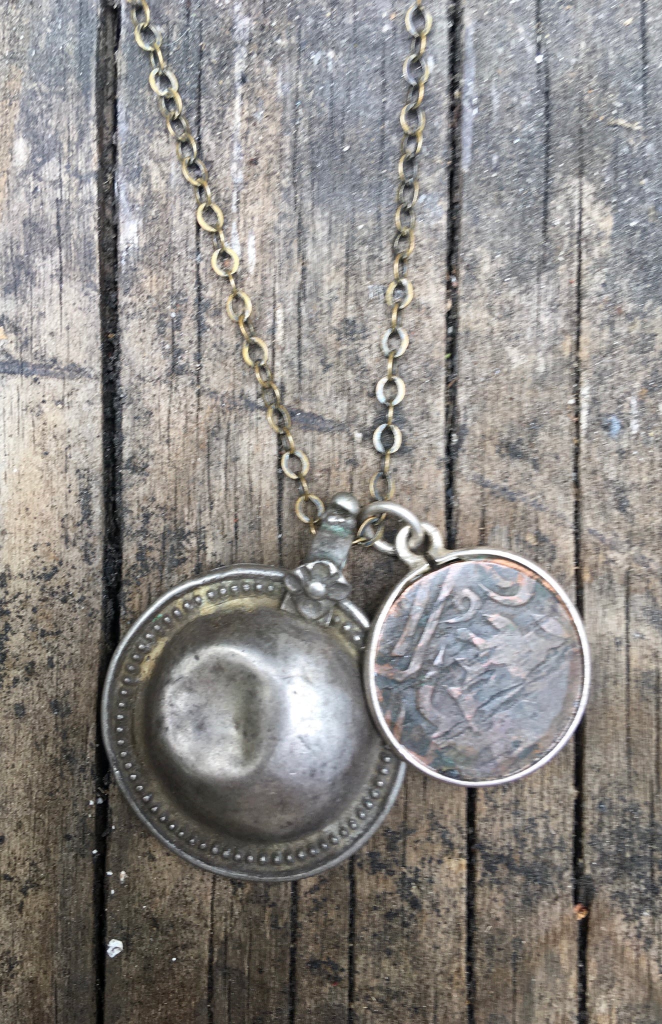 Tribal shield and Arabic coin necklace