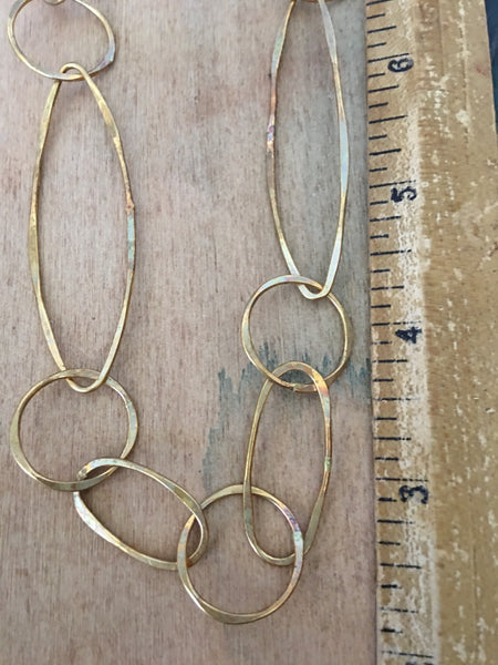 Asymmetrical brass chain