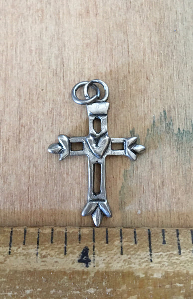 Heart centered brass cross